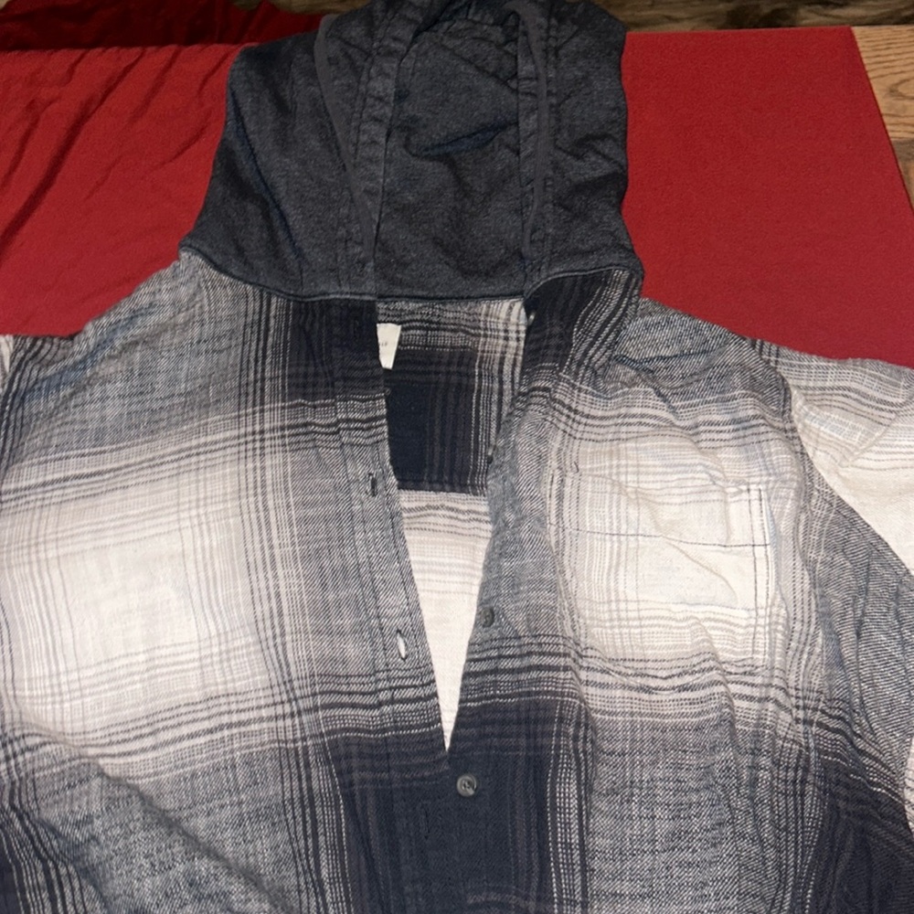 Black, white, and grey button up flannel with hood. American eagle size XL